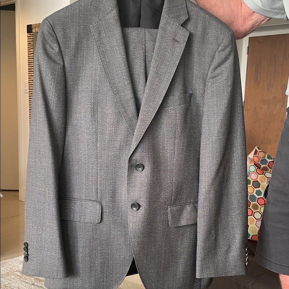 Boss by Hugo Boss mens 2 button all wool made in Italy suit.